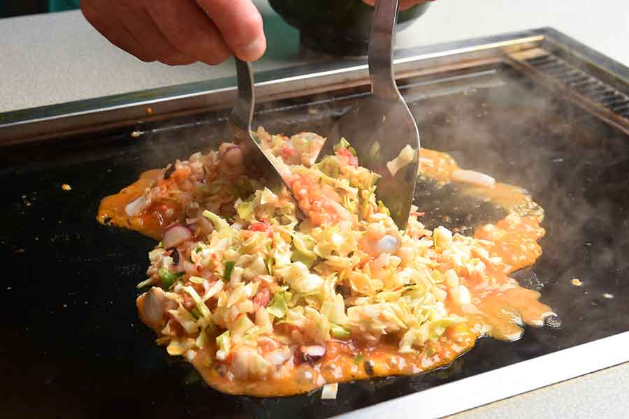 もんじゃ焼きにびっくり（写真はイメージ）【写真：PIXTA】