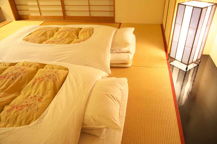 旅館の布団（写真はイメージ）【写真：PIXTA】