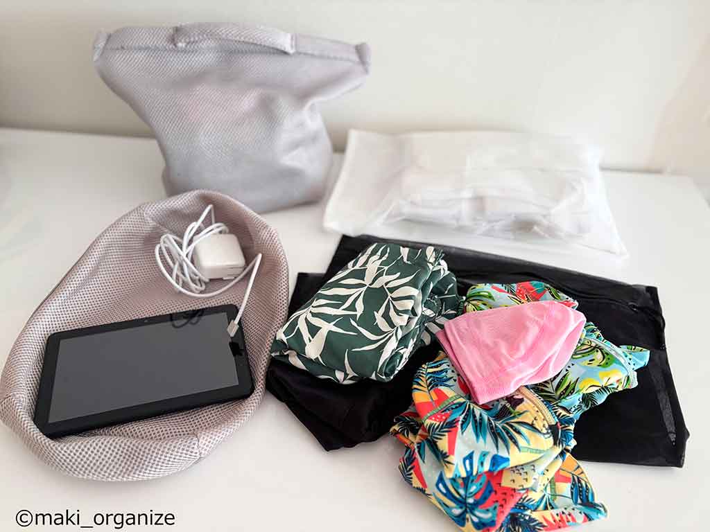 洗濯ネットに使用済みの衣類を入れて帰れば、そのまま洗濯機へ入れられる!【写真:伊藤まき】