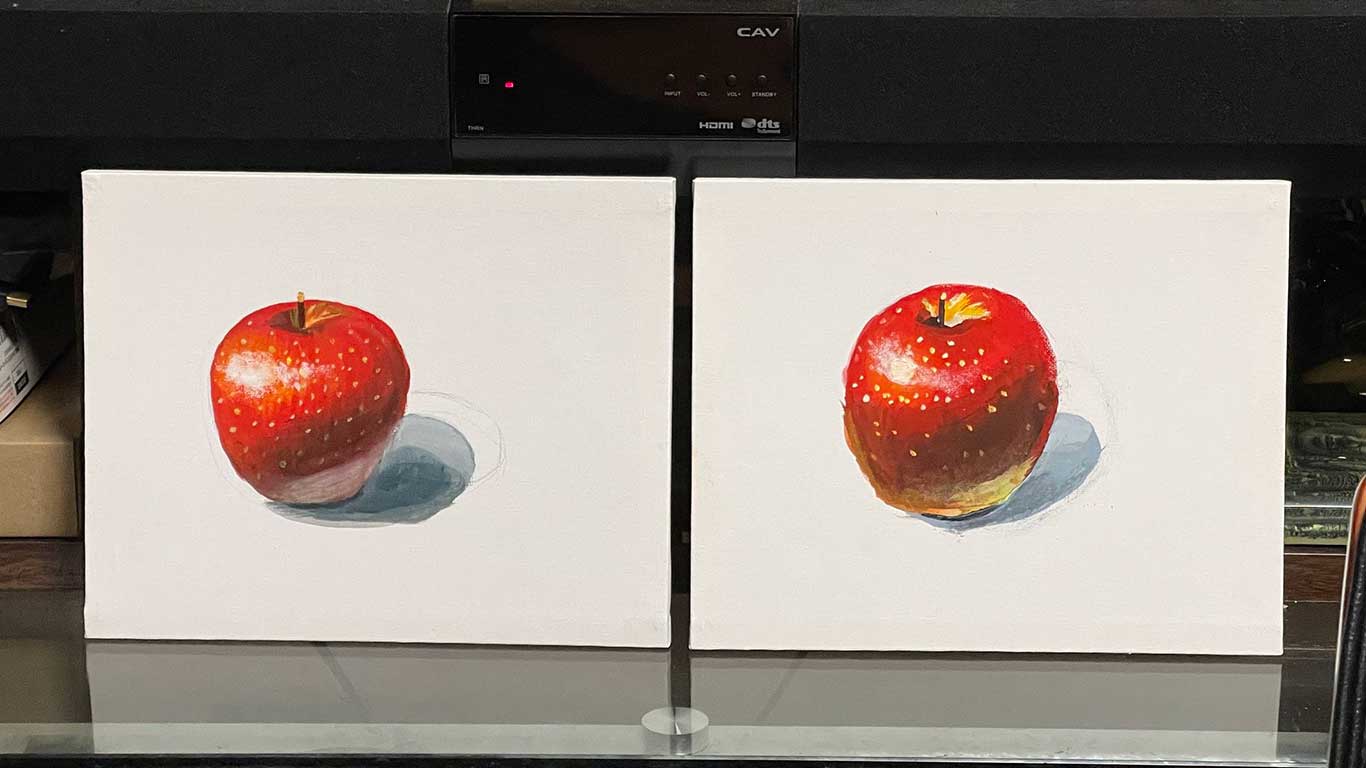 投稿者さんと配偶者さんが描いたリンゴの絵【写真提供：Katharine.（@Angulon65）さん】