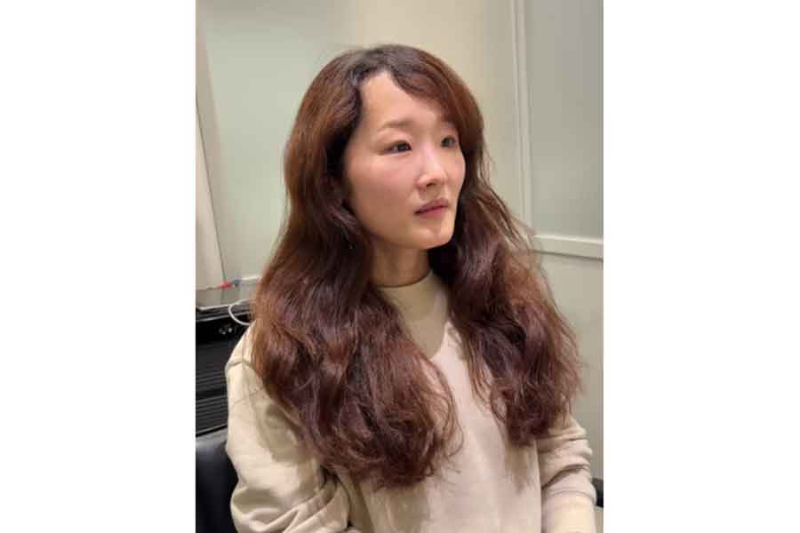 かけたパーマが理想通りにならなかった女性【出典：TikTok（hi_kuntoisho）よりスクリーンショット】