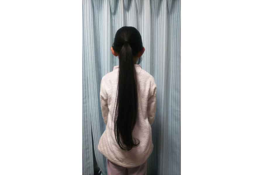 髪を伸ばしていた頃の娘さん。普段は一つ結びやお団子にしていたという【写真：本人提供】